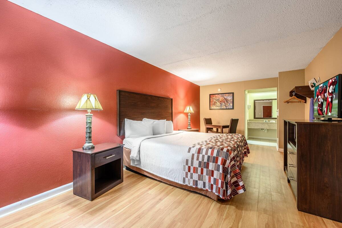 Blackout drapes, cribs (free), rollaway beds (surcharge), WiFi (free)