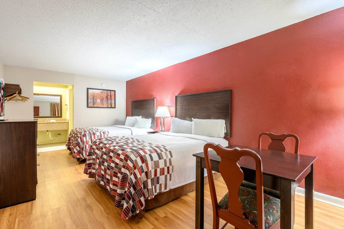Blackout drapes, cribs (free), rollaway beds (surcharge), WiFi (free)