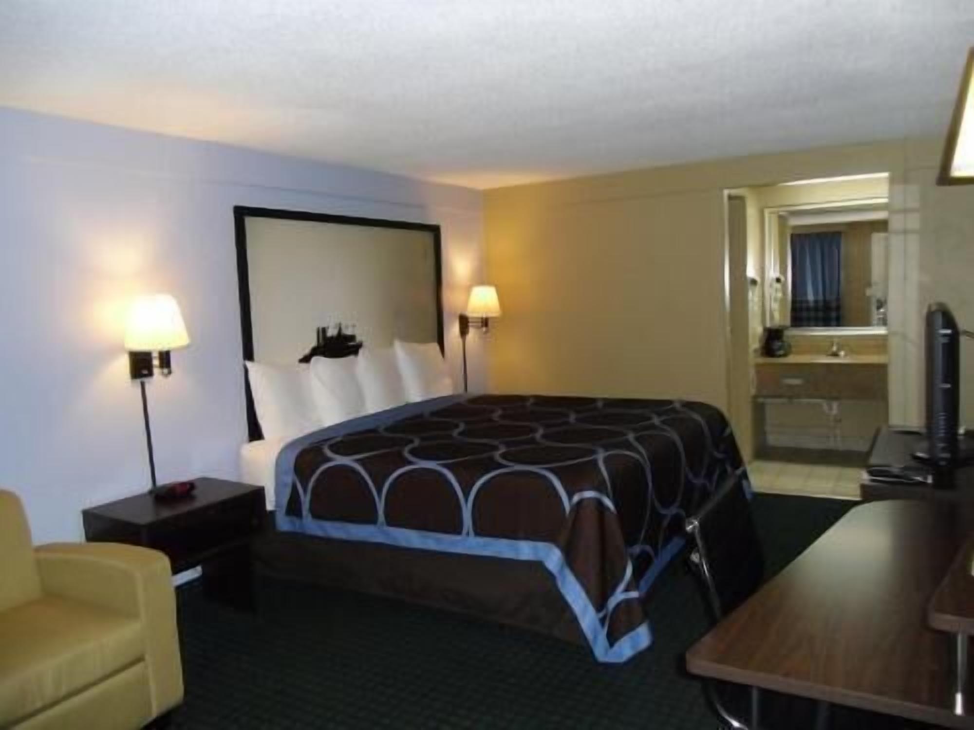 Desk, laptop workspace, blackout curtains, iron/ironing board