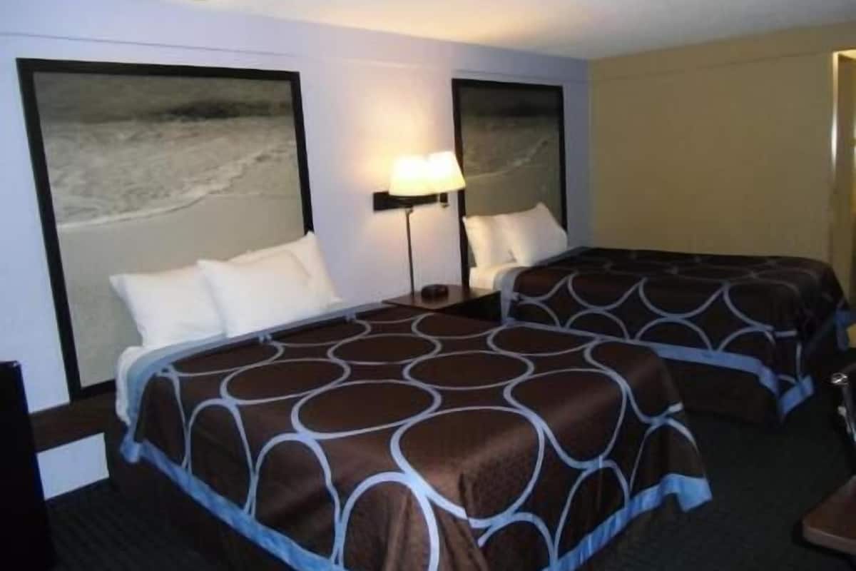 Desk, laptop workspace, blackout curtains, iron/ironing board