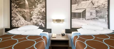 Tabla de planchar con plancha, camas extra, wifi gratis y ropa de cama