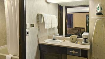 Combined shower/tub, deep soaking tub, free toiletries, towels