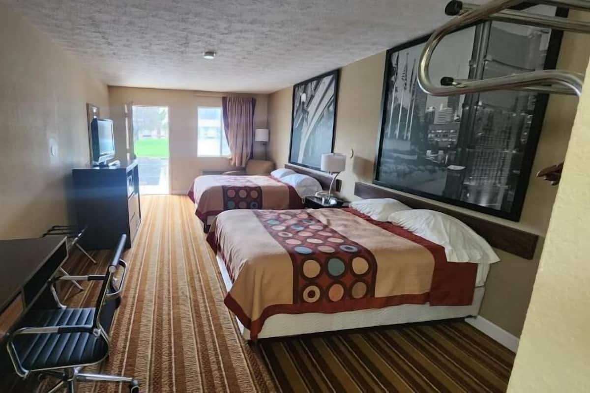 Desk, laptop workspace, blackout curtains, iron/ironing board