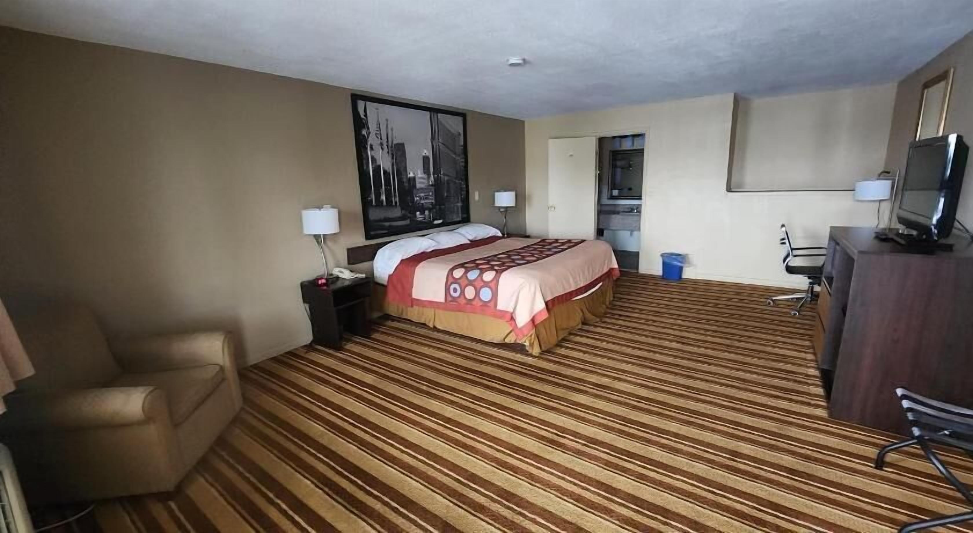 Desk, laptop workspace, blackout curtains, iron/ironing board