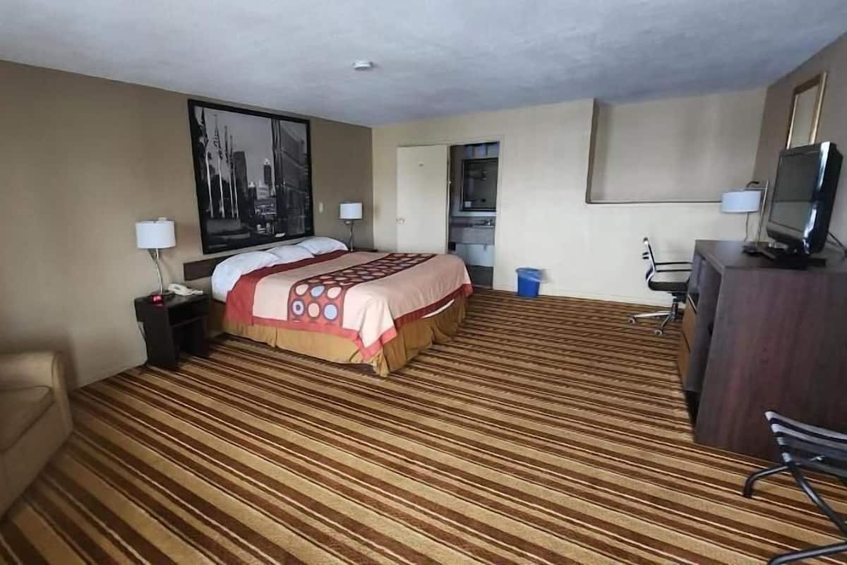 Desk, laptop workspace, blackout curtains, iron/ironing board