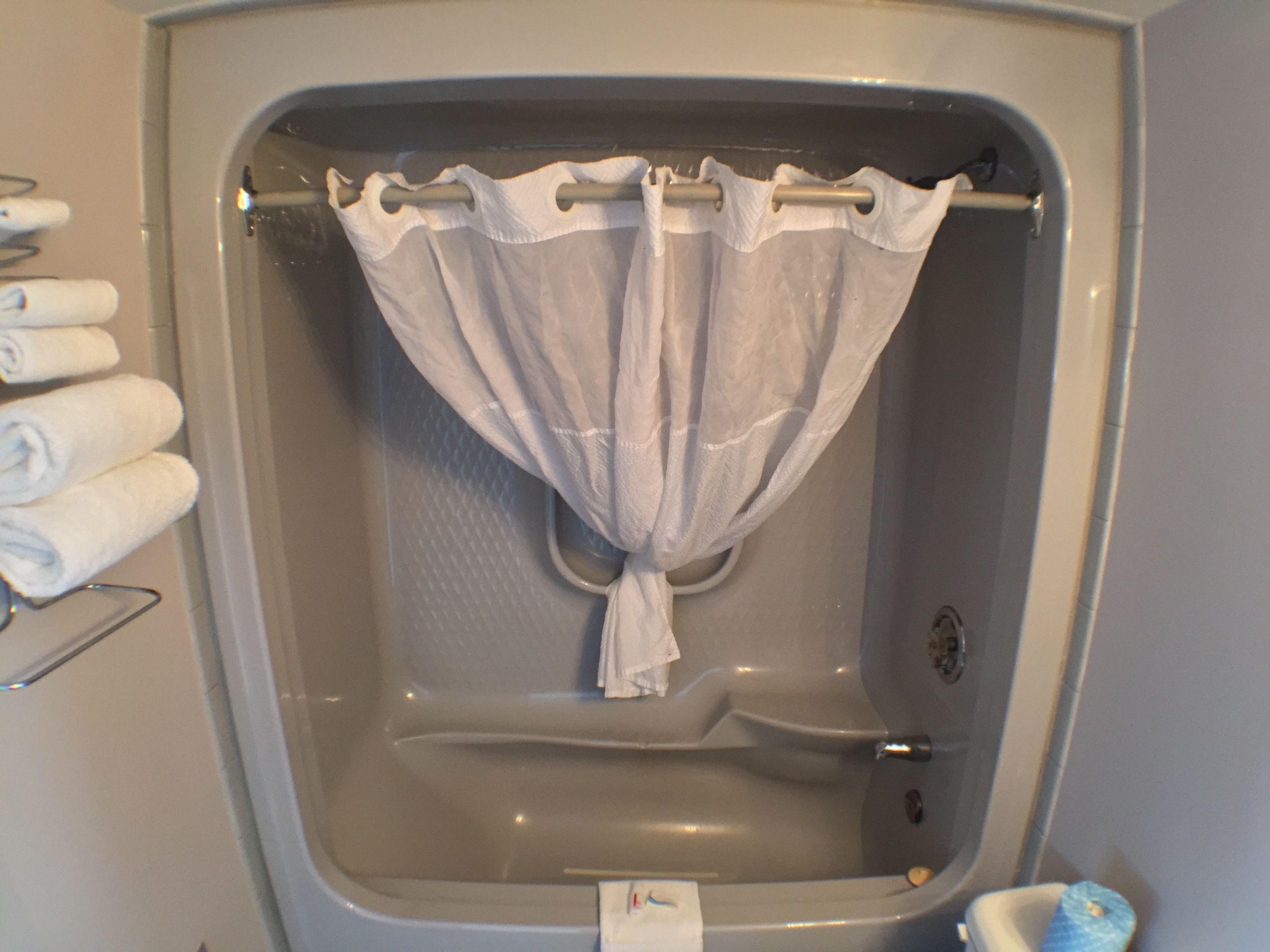 combined shower/bathtub, free toiletries, hair dryer, towels