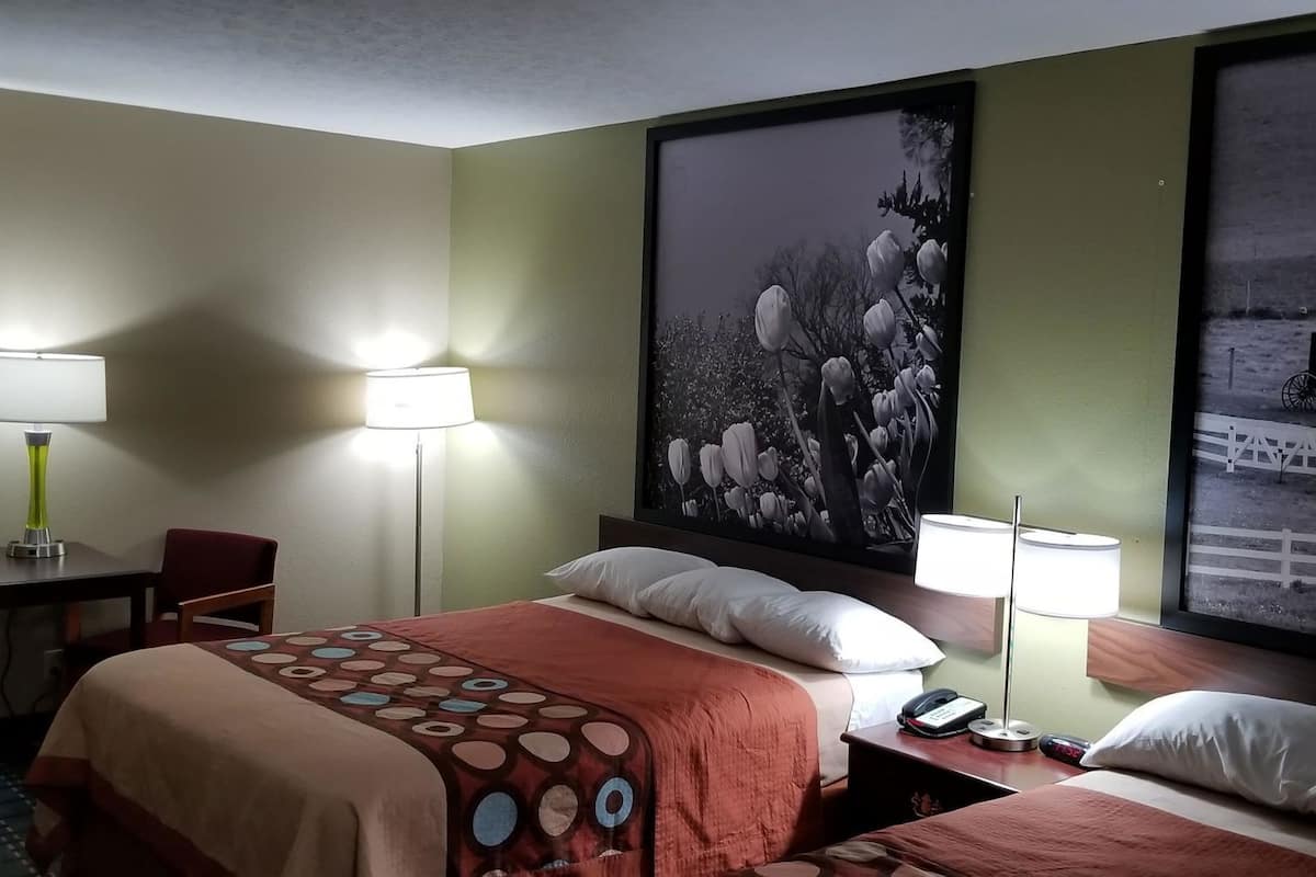 Desk, blackout curtains, iron/ironing board, rollaway beds