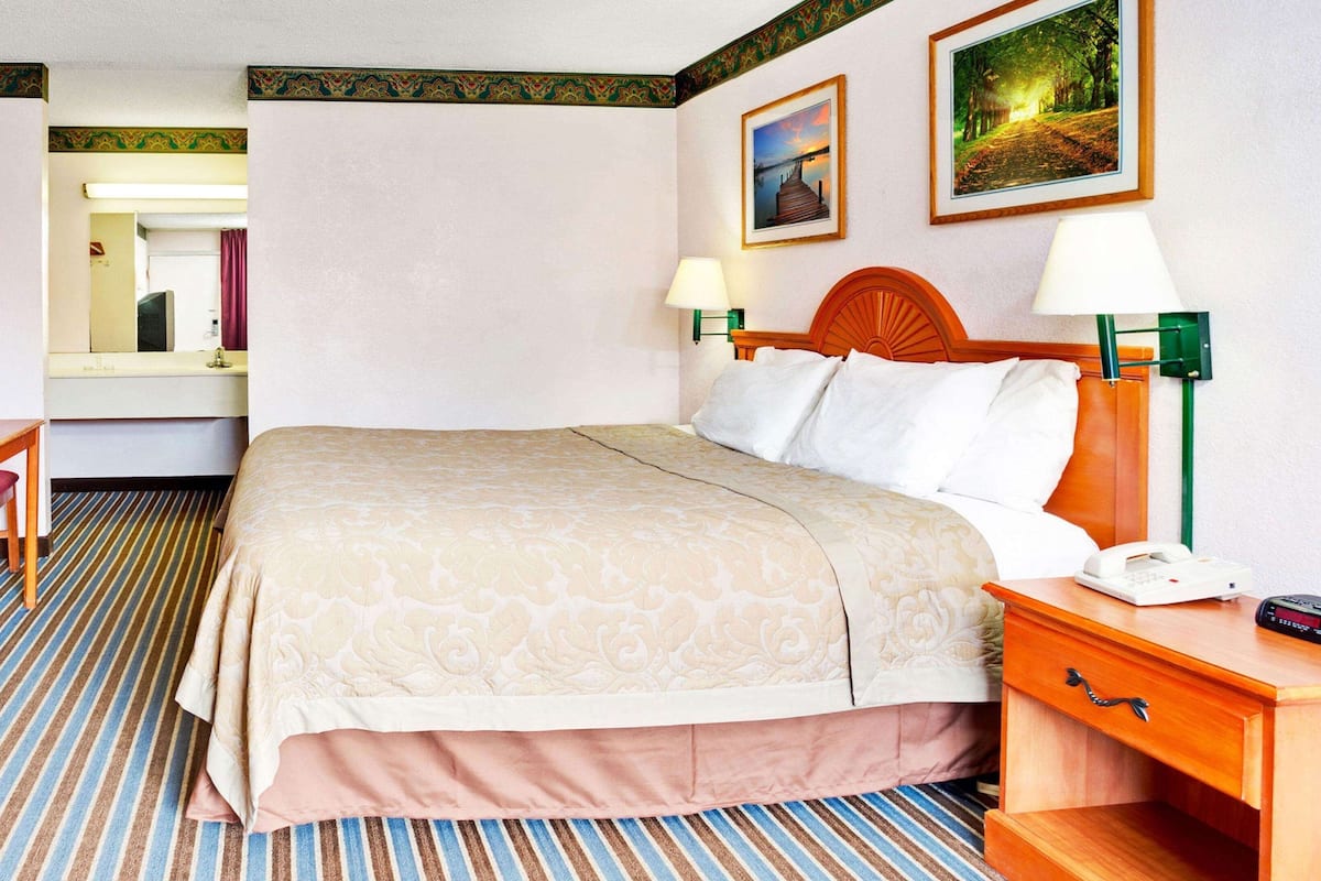 Room, 1 King Bed, Non Smoking, Refrigerator & Microwave, Accessible | Iron/ironing board, free WiFi, bed sheets, alarm clocks