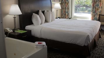 Suite, 1 King Bed, Non Smoking, Jetted Tub | Desk, laptop workspace, blackout drapes, iron/ironing board