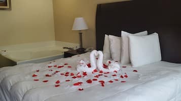 Suite, 1 King Bed, Non Smoking, Jetted Tub | Desk, laptop workspace, blackout drapes, iron/ironing board