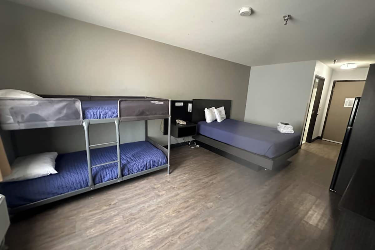 Family Room, 1 Queen Bed and 1 Twin Bunk Bed, Non Smoking, Non-Accessible | 1 bedroom, desk, laptop workspace, iron/ironing board