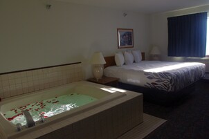 Deluxe Suite, 1 King Bed with Sofa bed, Jetted Tub | Desk, iron/ironing board, free WiFi, bed sheets