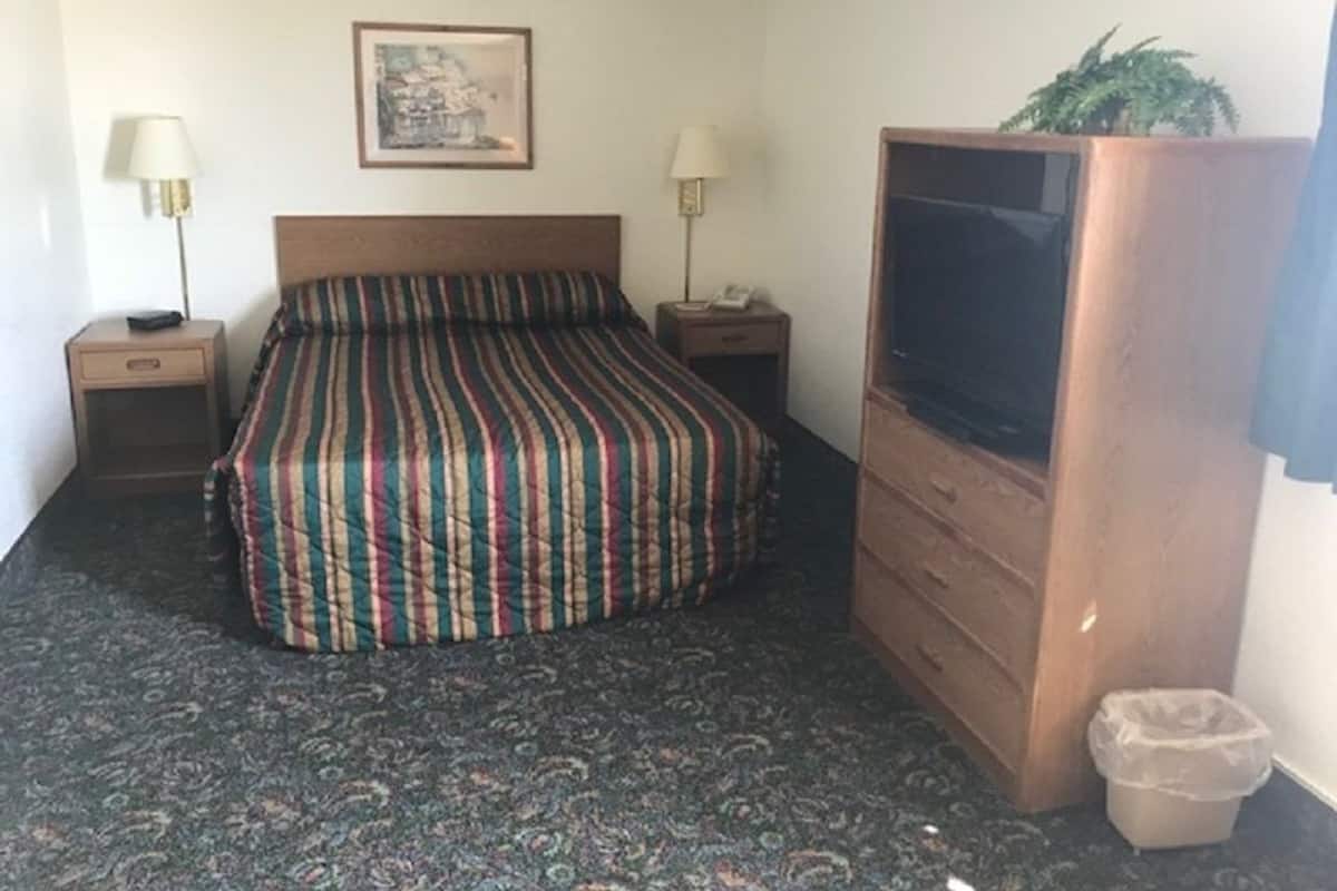 1 habitación, tabla de planchar con plancha, wifi gratis y ropa de cama