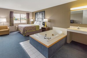 Deluxe Studio Suite, 1 King Bed, Non Smoking | Desk, blackout drapes, iron/ironing board, free WiFi