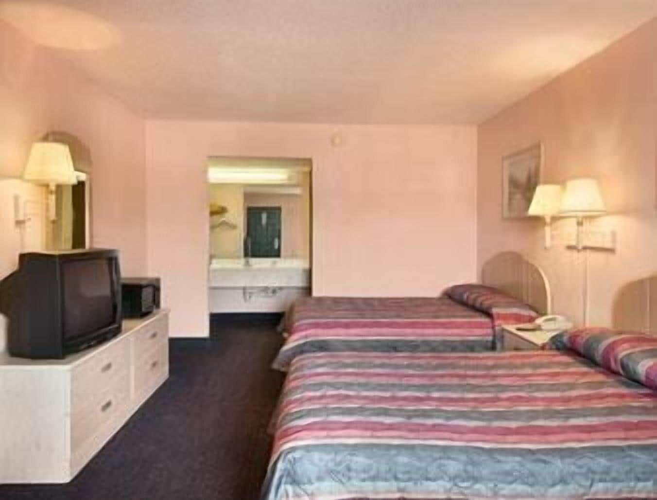 Desk, laptop workspace, blackout curtains, iron/ironing board