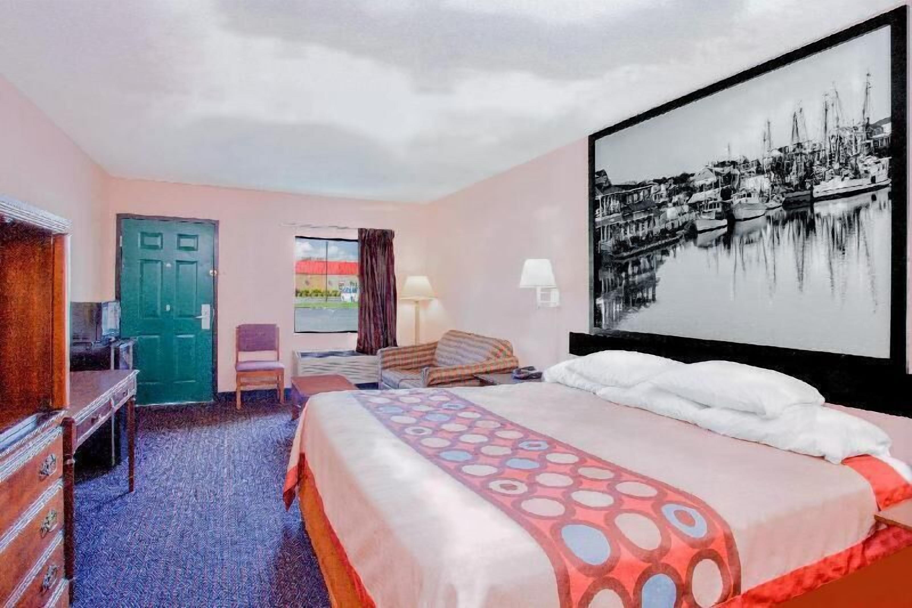 Desk, laptop workspace, blackout curtains, iron/ironing board