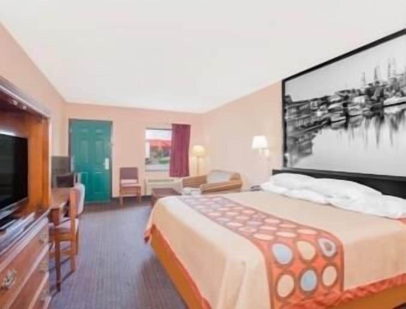 Desk, laptop workspace, blackout curtains, iron/ironing board