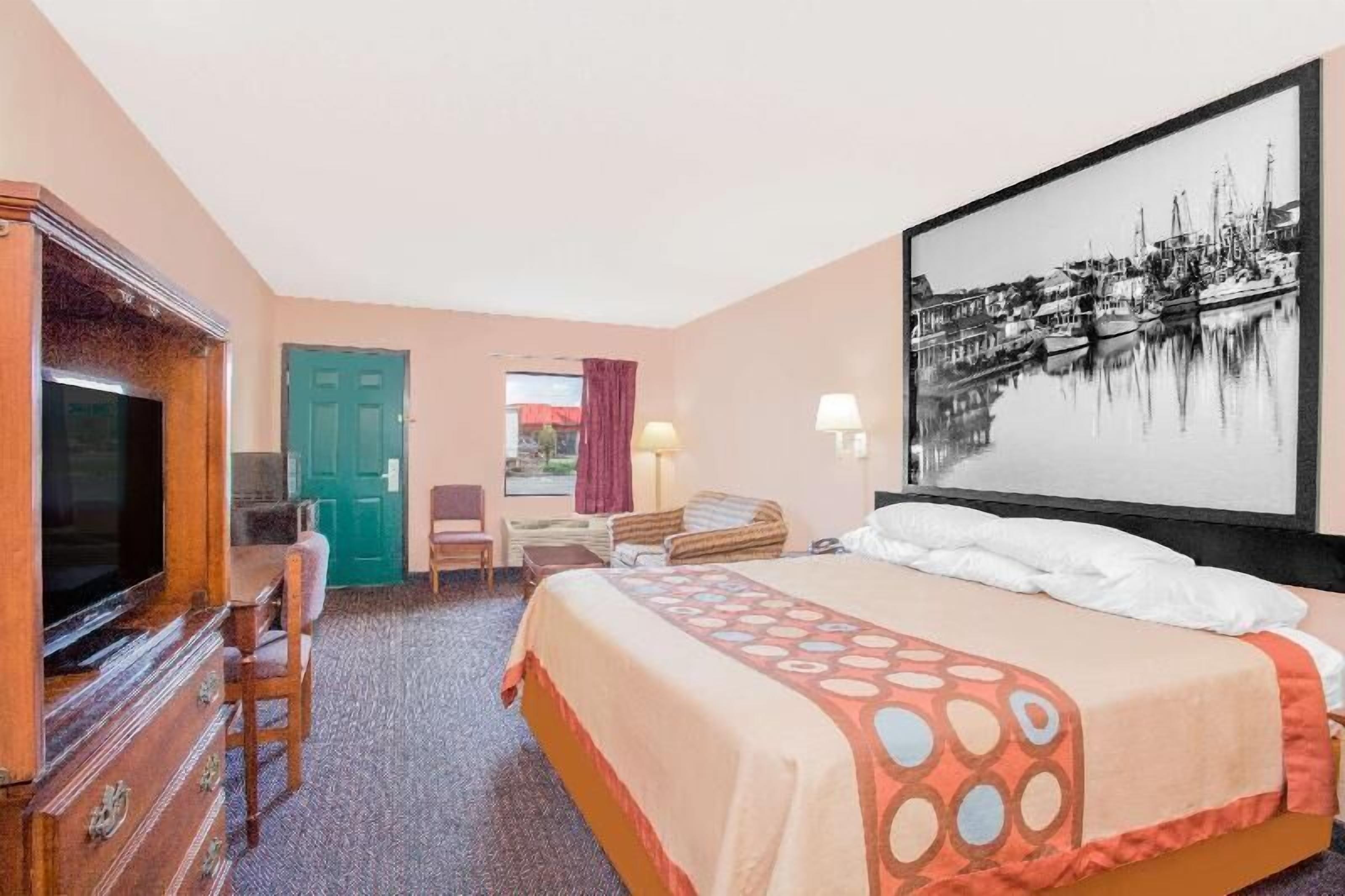 Desk, laptop workspace, blackout curtains, iron/ironing board