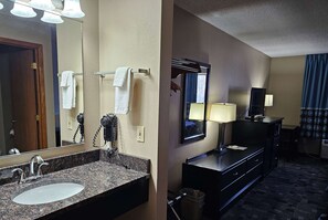 Combined shower/tub, deep soaking tub, free toiletries, hair dryer