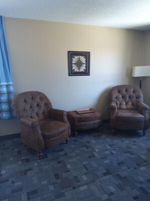 Suite, 1 King Bed, Non Smoking | Living area | 43-inch TV with satellite channels