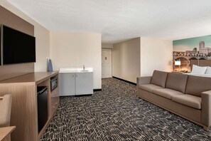 Desk, laptop workspace, blackout drapes, iron/ironing board