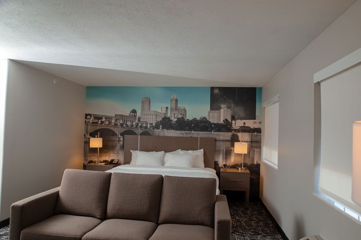 Desk, laptop workspace, blackout curtains, iron/ironing board