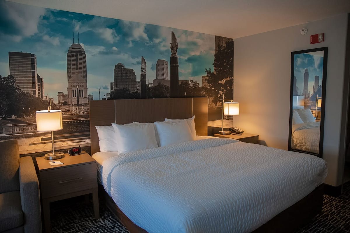 Desk, laptop workspace, blackout curtains, iron/ironing board