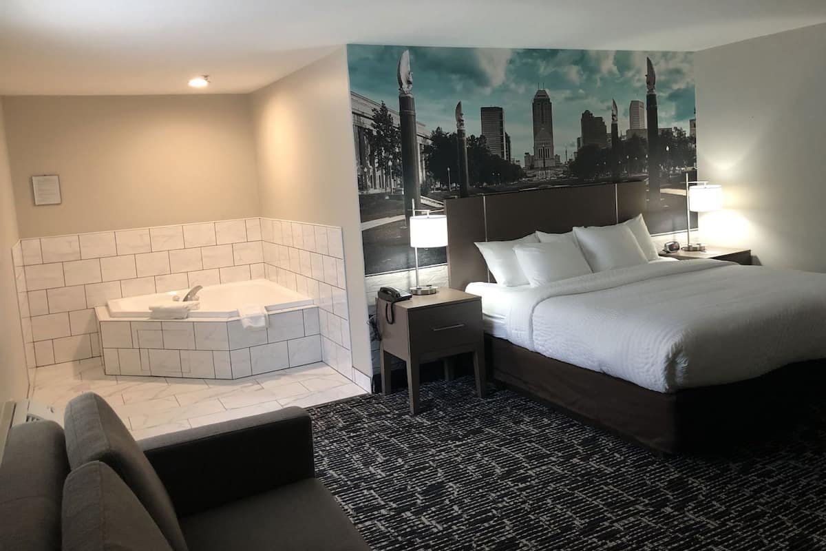 Desk, laptop workspace, blackout curtains, iron/ironing board