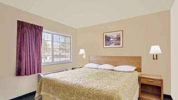 Suite, 1 Bedroom, Non Smoking (1 King Bed) | Hypo-allergenic bedding, desk, blackout curtains, iron/ironing board