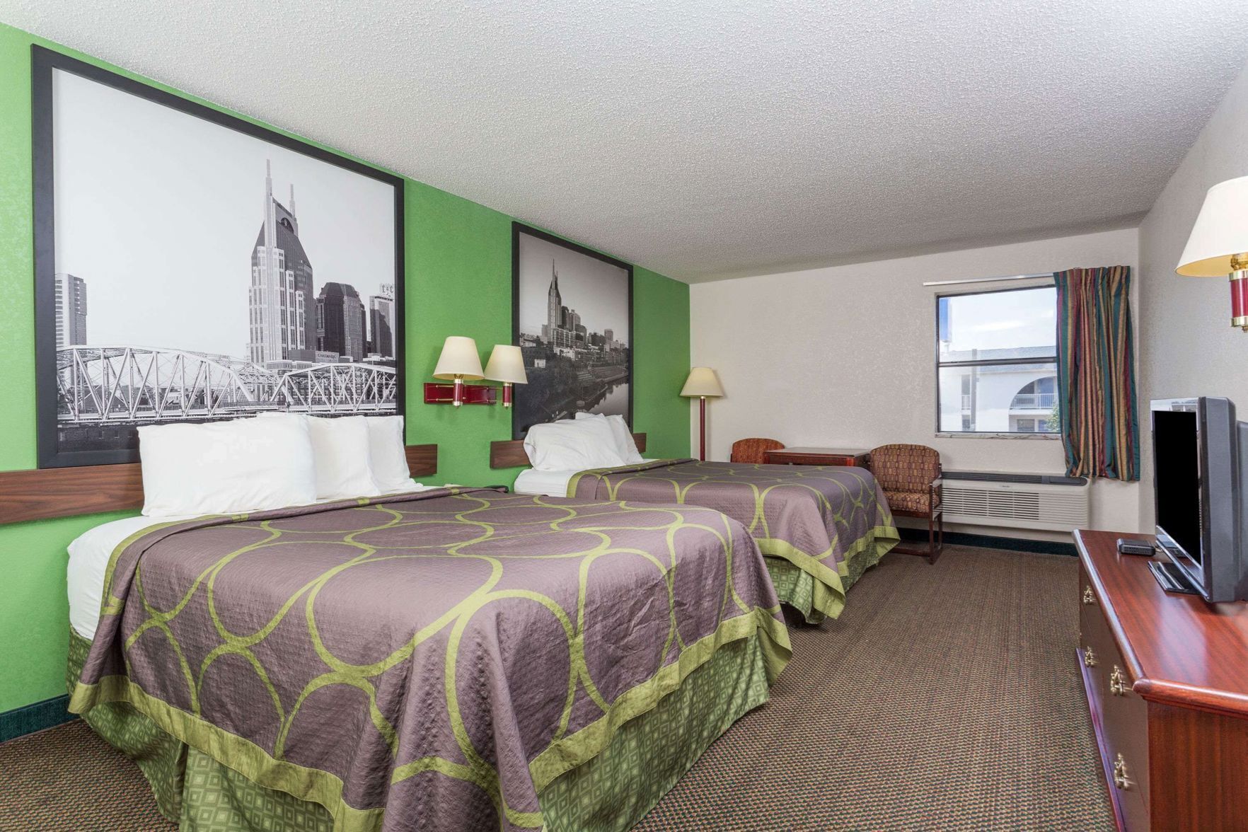 Desk, blackout curtains, iron/ironing board, rollaway beds