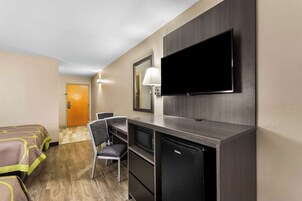 Desk, blackout drapes, iron/ironing board, rollaway beds