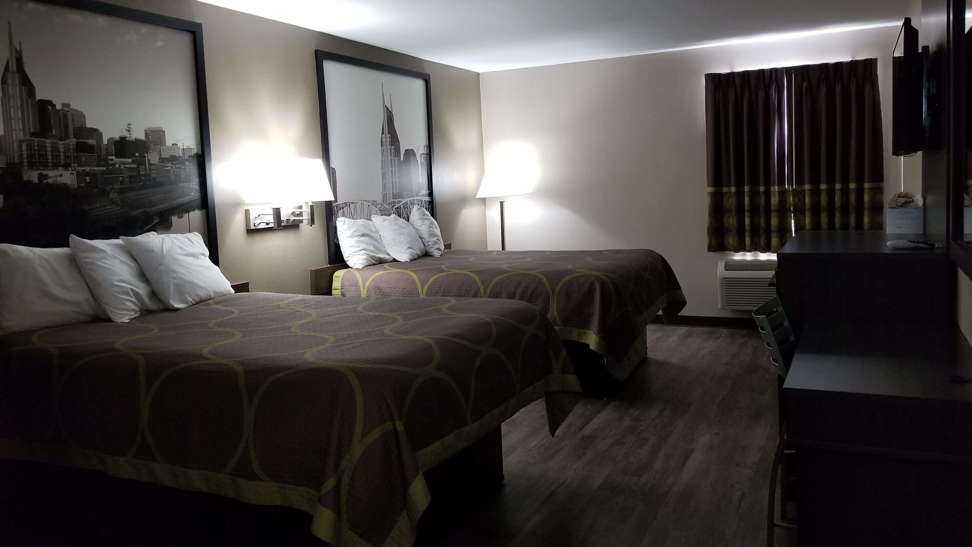 Desk, blackout curtains, iron/ironing board, rollaway beds