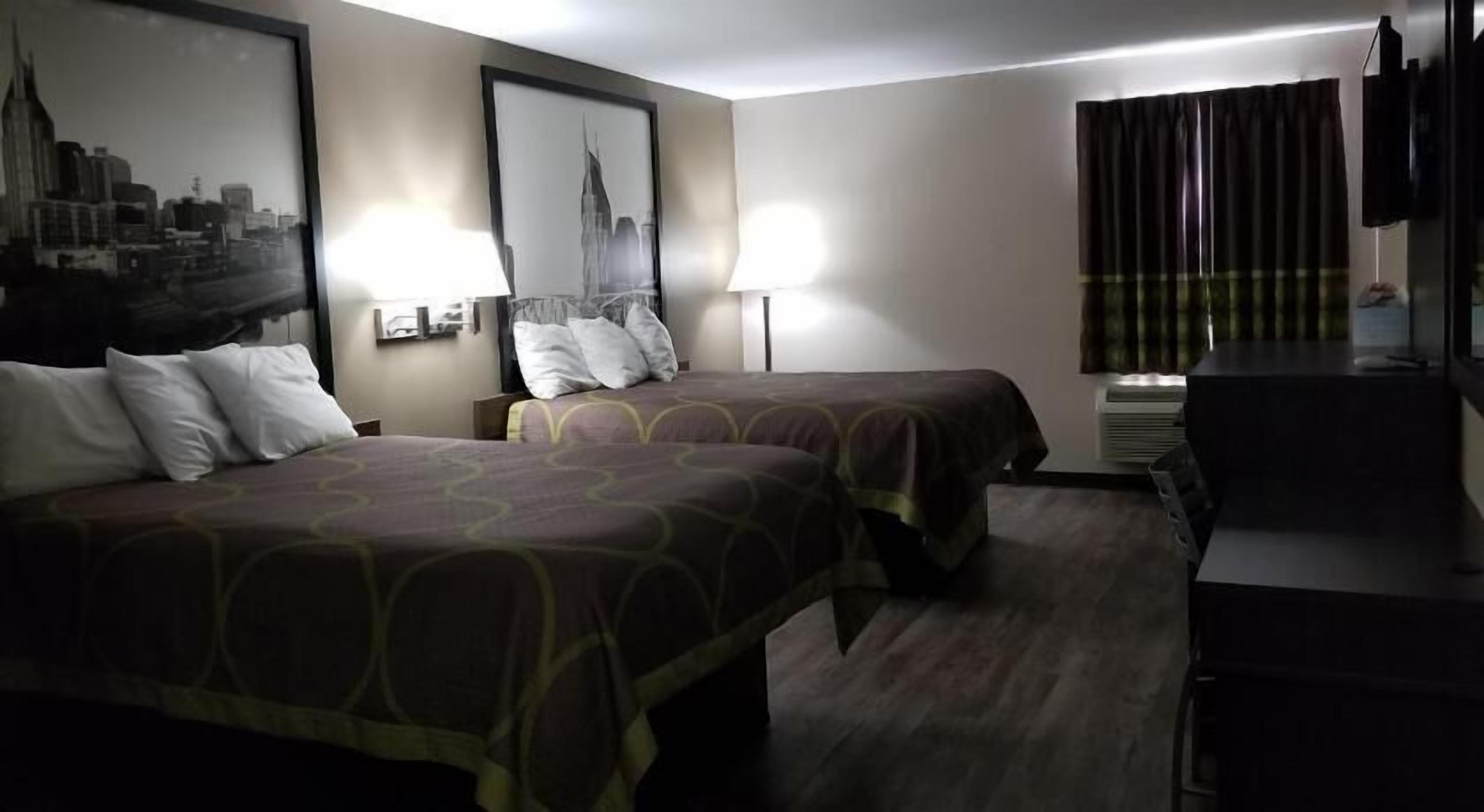 Desk, blackout curtains, iron/ironing board, rollaway beds