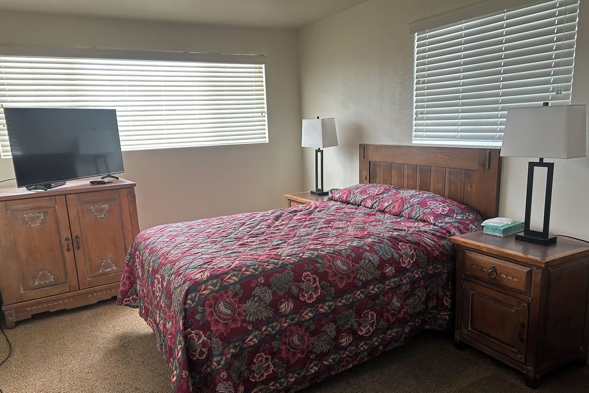Suite, Multiple Beds, Non Smoking (Offsite) | Blackout drapes, iron/ironing board, free cribs/infant beds