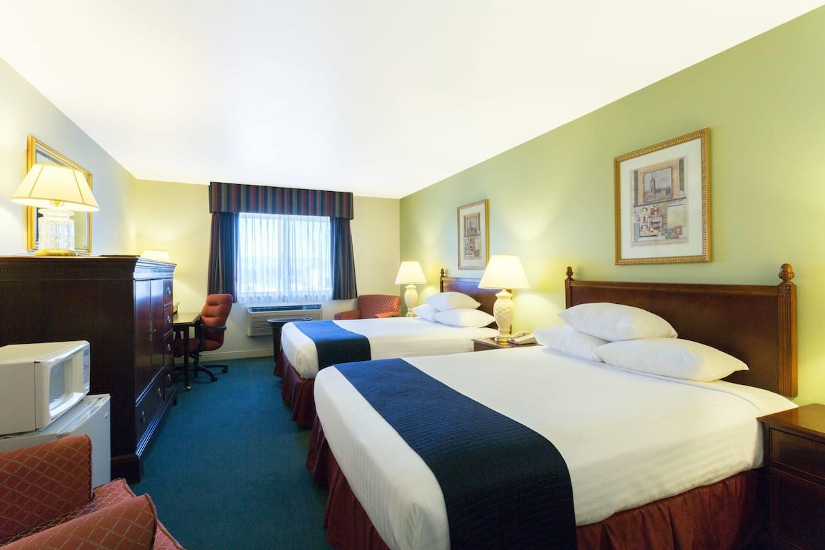 Room, 2 Queen Beds, Non Smoking | Blackout drapes, iron/ironing board, free cribs/infant beds