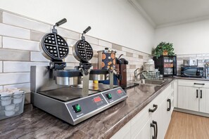 Suite, Multiple Beds, Non Smoking (Offsite) | Living area | Flat-screen TV