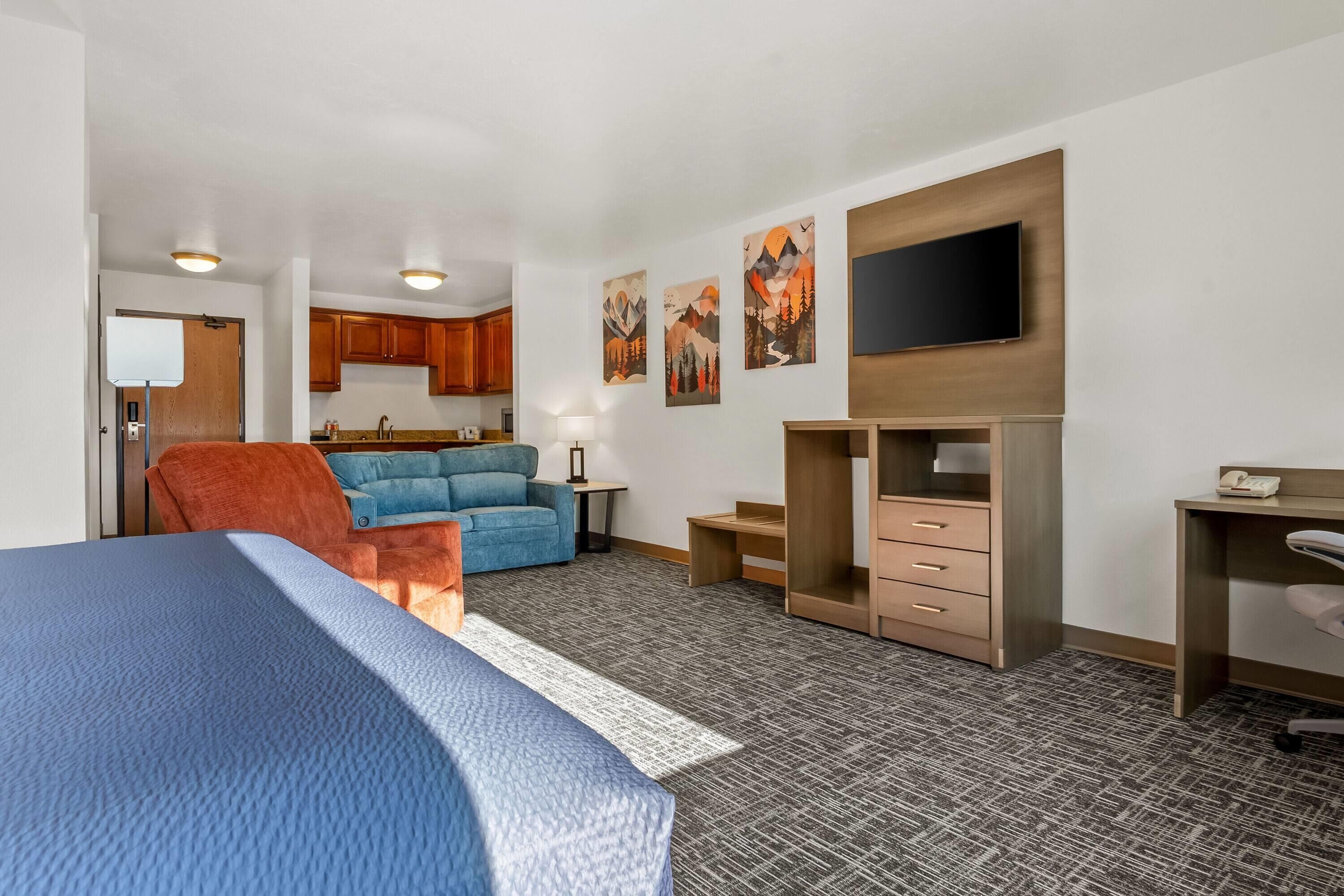 Suite, 1 King Bed, Non Smoking | Blackout drapes, iron/ironing board, free cribs/infant beds