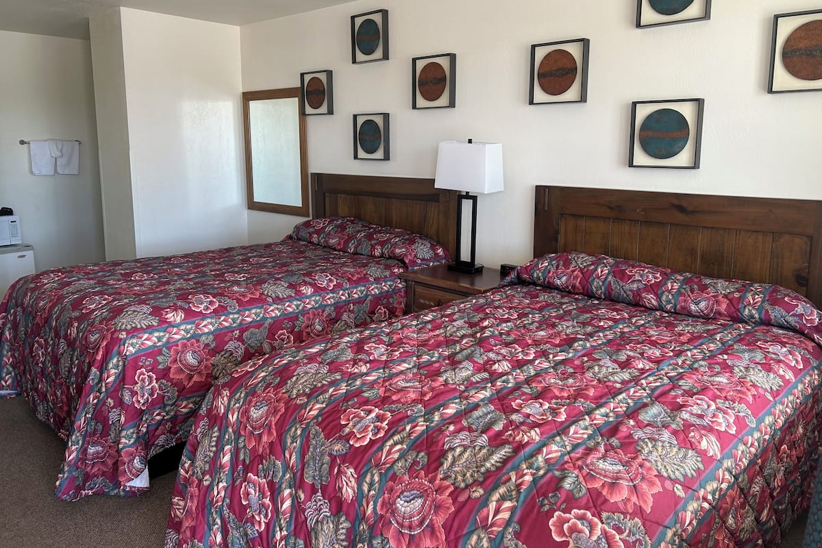 Blackout drapes, iron/ironing board, free cribs/infant beds