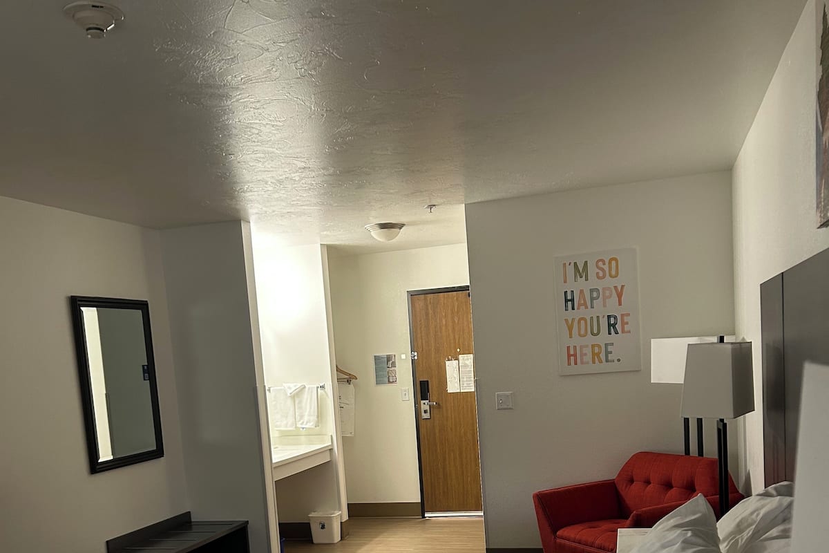 Blackout drapes, iron/ironing board, free cribs/infant beds