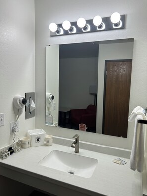 Hair dryer, towels, soap, shampoo
