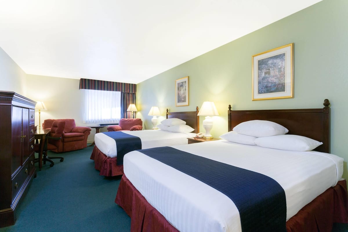 Room, 2 Double Beds, Non Smoking (Offsite) | Blackout drapes, iron/ironing board, free cribs/infant beds