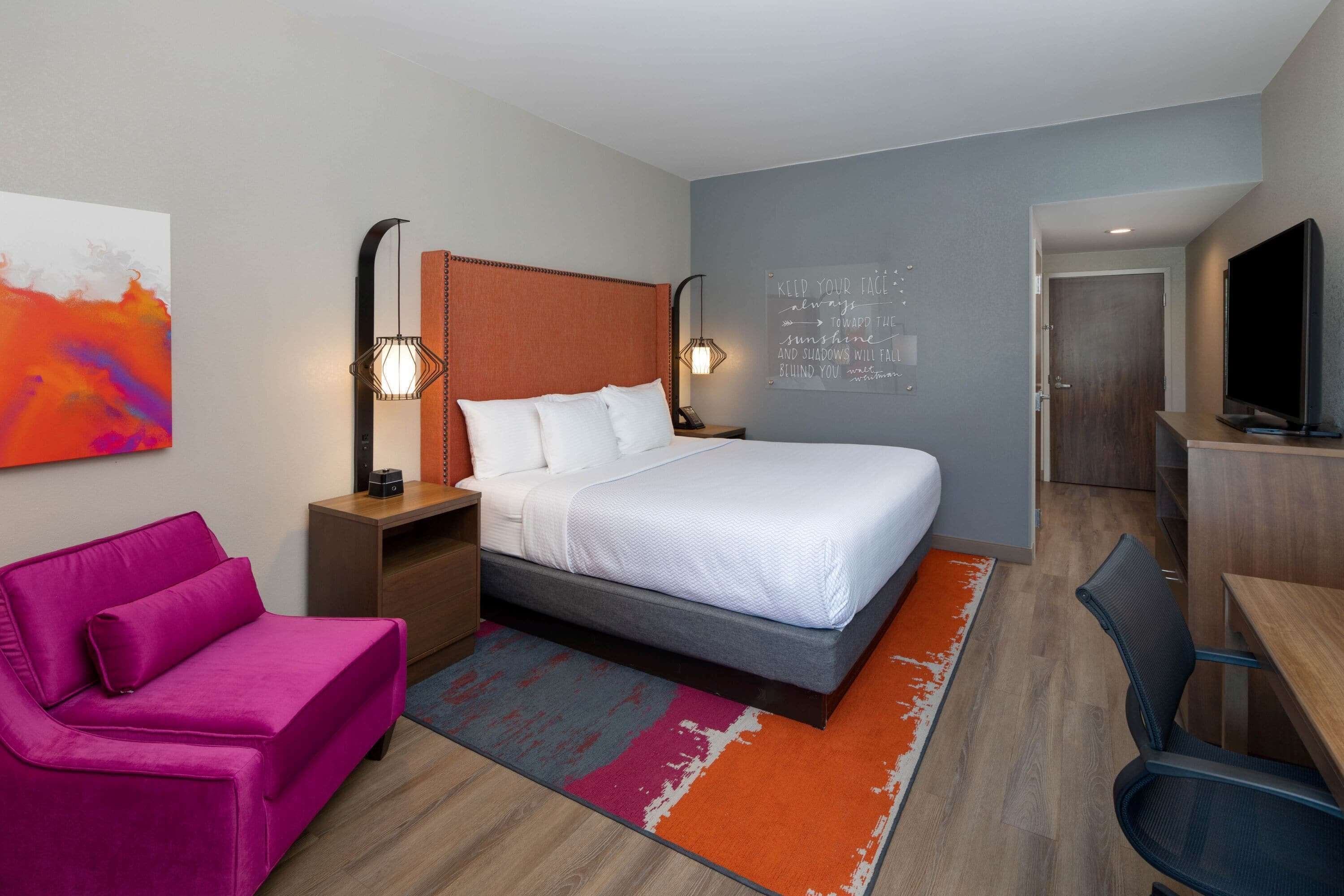 desk, laptop workspace, blackout curtains, iron/ironing board