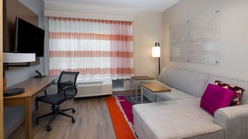 Desk, laptop workspace, blackout curtains, iron/ironing board