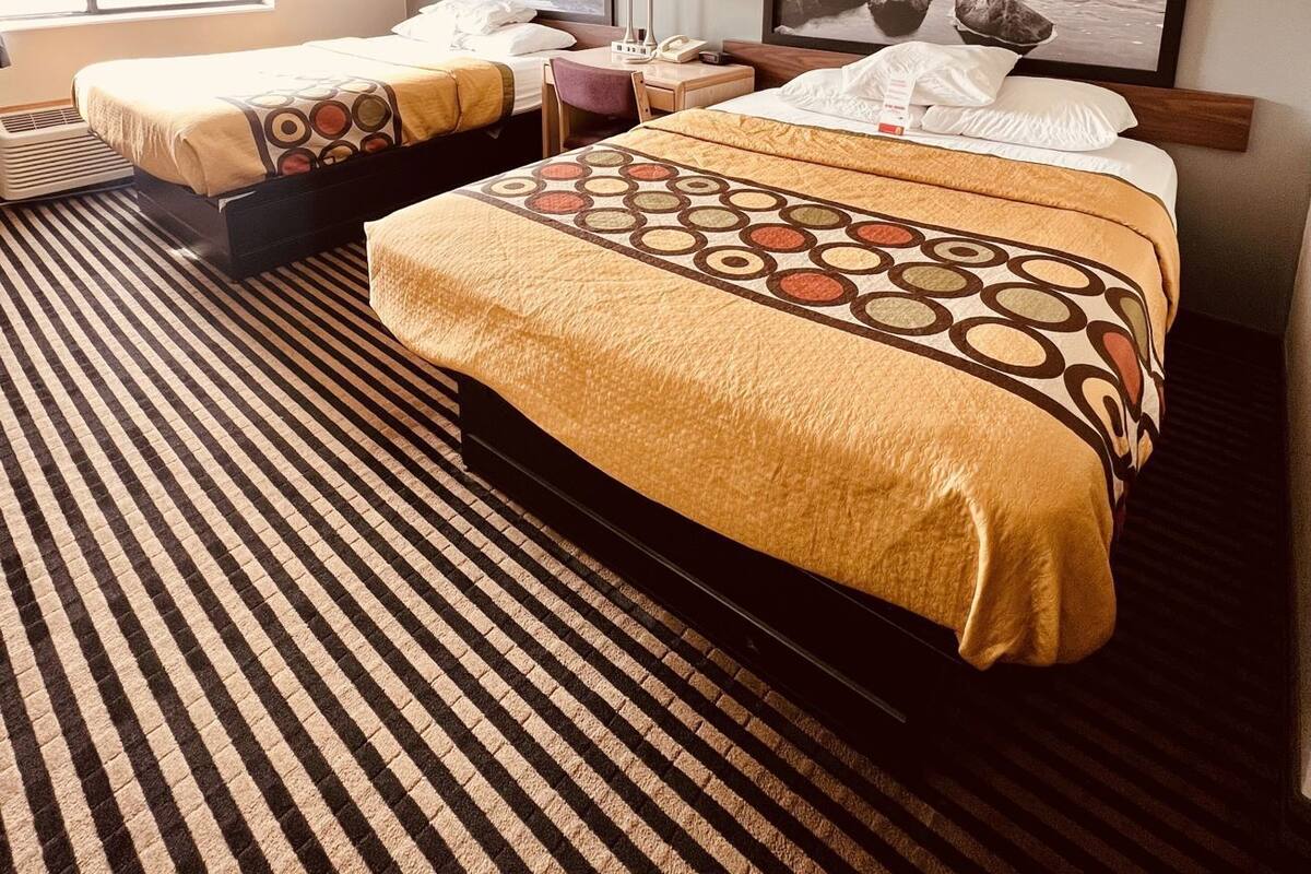 Desk, blackout drapes, iron/ironing board, cribs/infant beds