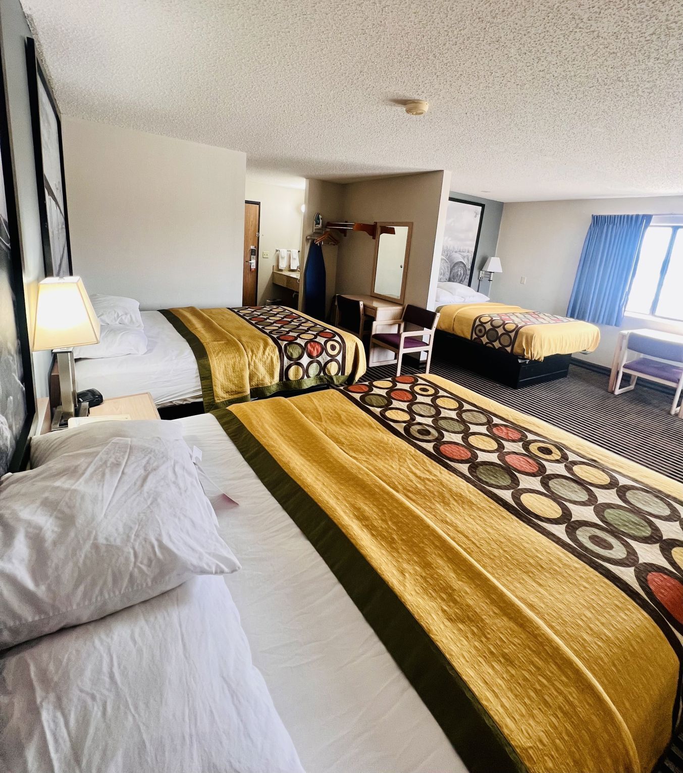 Desk, blackout drapes, iron/ironing board, cribs/infant beds