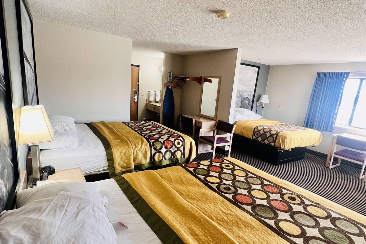 Desk, blackout drapes, iron/ironing board, cribs/infant beds