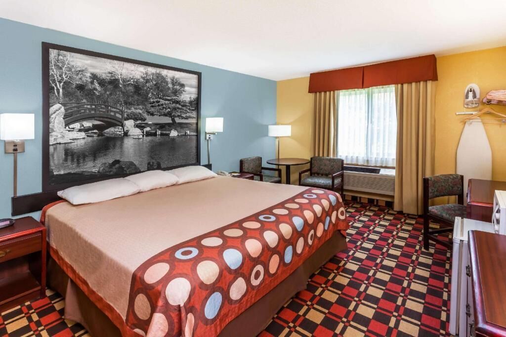 Desk, blackout drapes, iron/ironing board, free cribs/infant beds