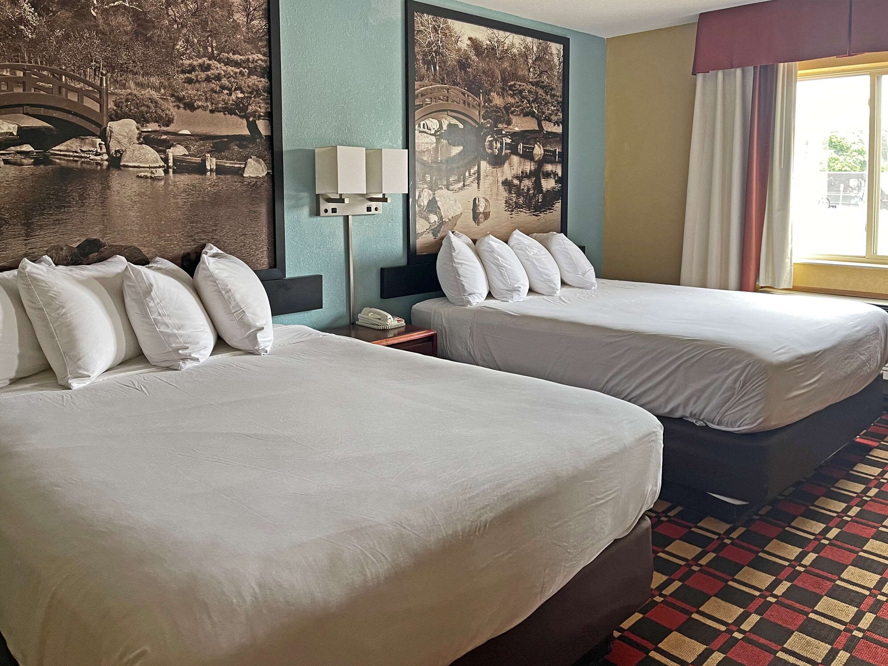 Desk, blackout curtains, iron/ironing board, free cots/infant beds