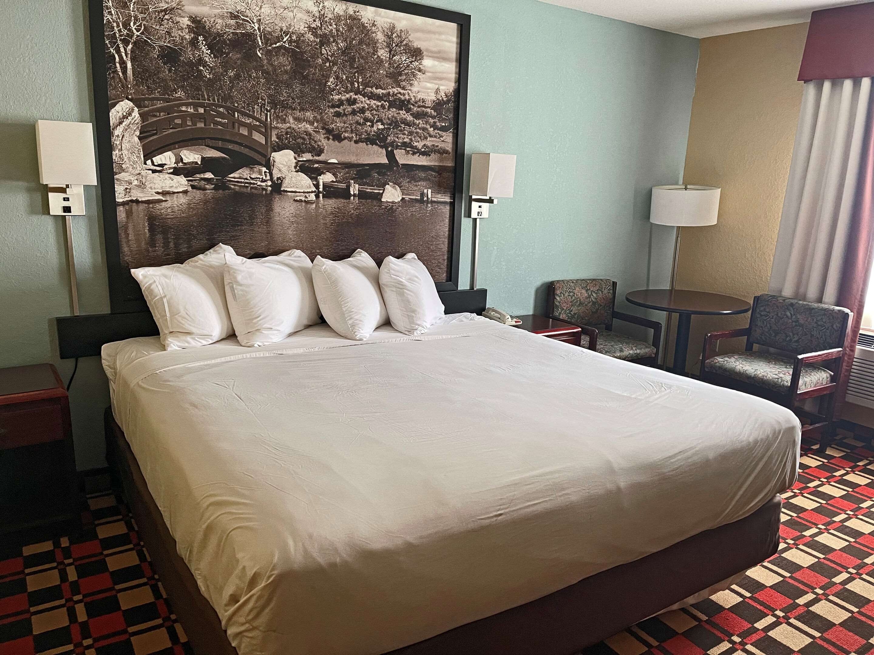 Desk, blackout curtains, iron/ironing board, free cots/infant beds