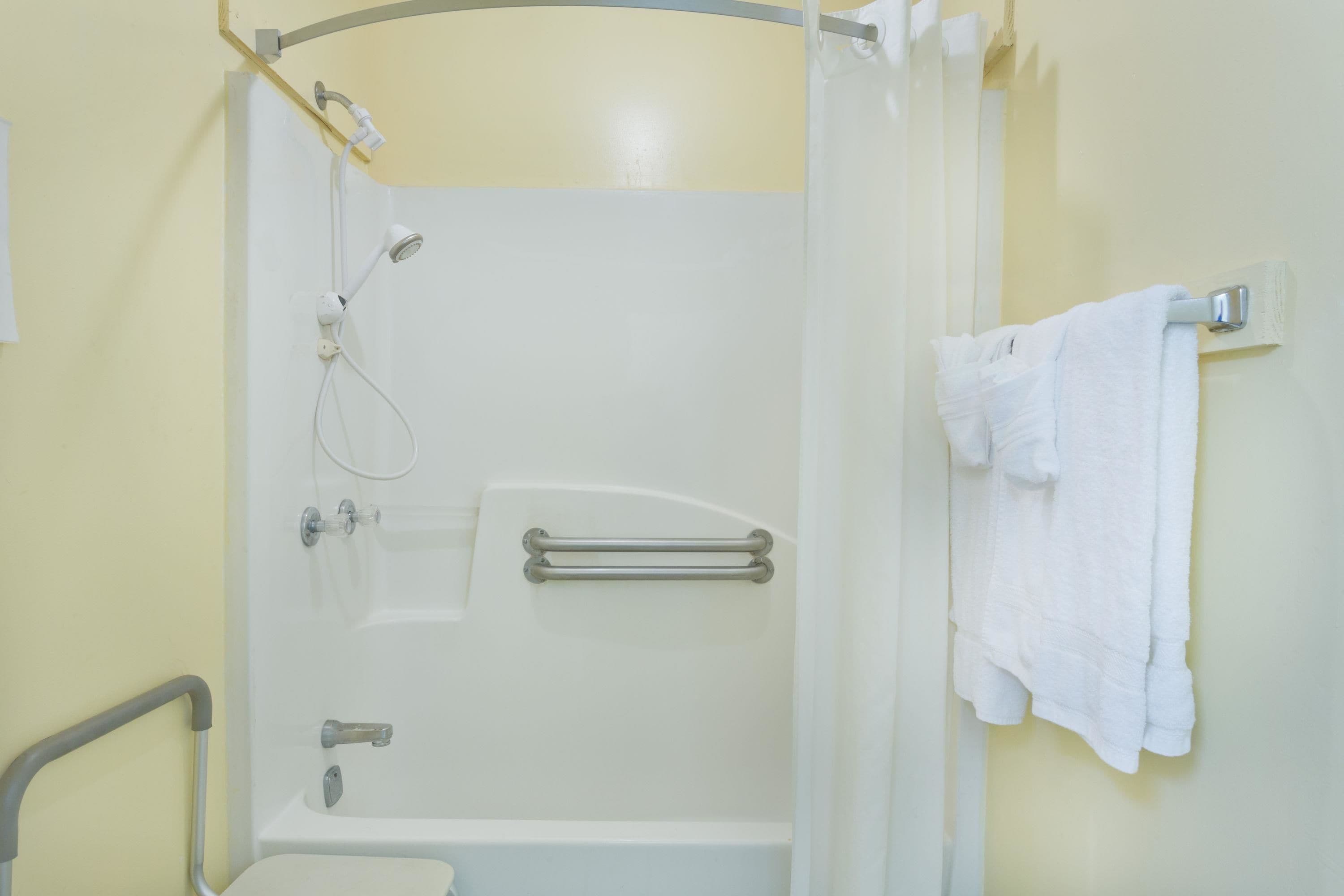 Room, 2 Double Beds, Accessible, Smoking (Mobility) | Bathroom | Combined shower/bathtub, free toiletries, hair dryer, towels